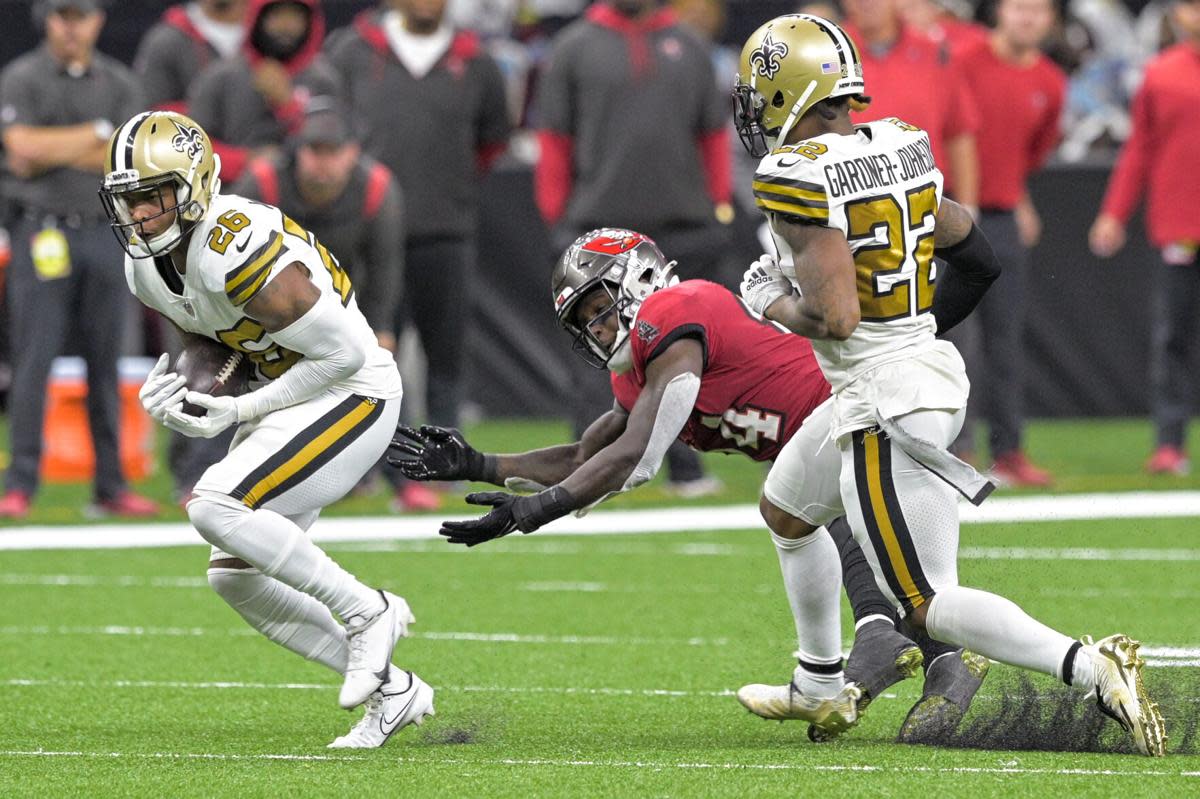 Saints S P.J. Williams (26) returns an interception for the game-clinching touchdown against Tampa Bay. Credit: Nola.com
